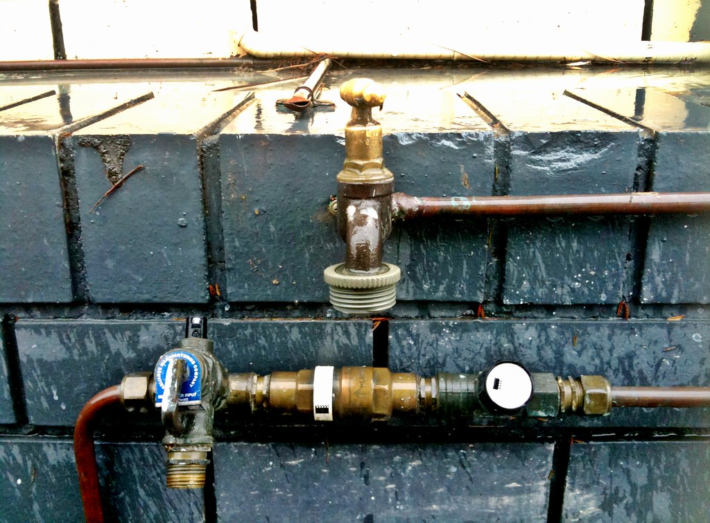 Exposed copper pipe with washing tap