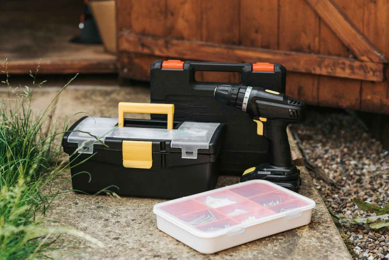 tool box A collection of toolboxes and a power drill
